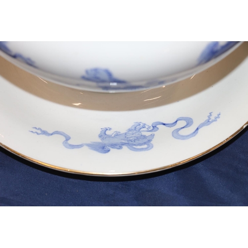 152 - Early 20th century Wedgwood blue and white tureen and stand decorated with Foo Dogs, 26cm high.