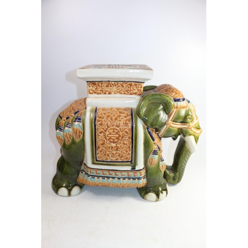 159 - Chinese jardinière stand in the form of an Indian elephant, 41cm high.