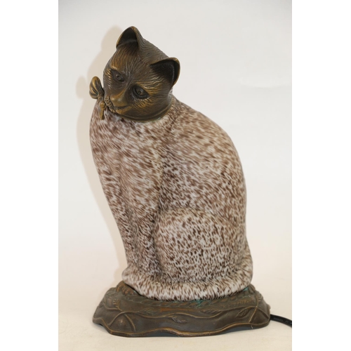 68 - Mottled glass and bronzed table lamp in the form of a cat, signed Tinchi 1996, 29cm high.