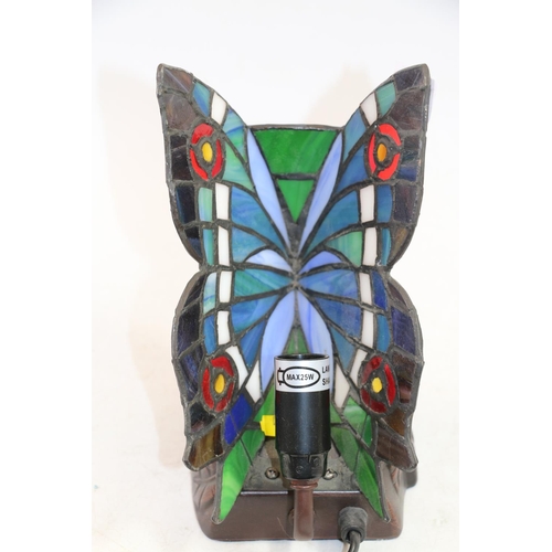 72 - Leaded glass table lamp in the form of butterfly.