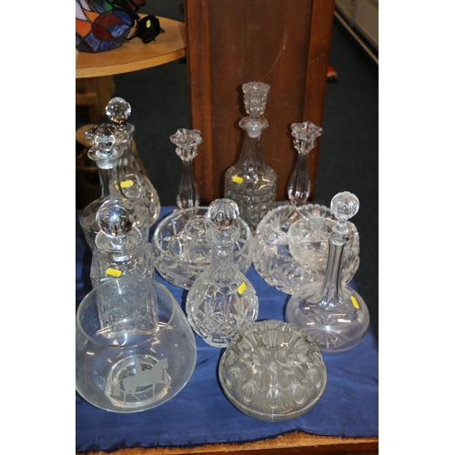 74 - Cut-glass to include an Edinburgh Crystal decanter, fruit bowls, and a Caithness Glass bowl.