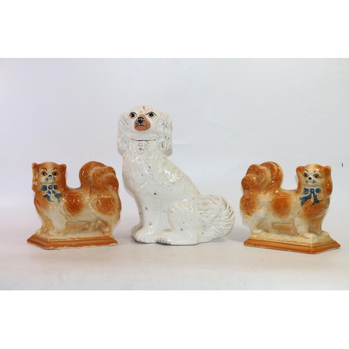 76 - Pair of Staffordshire style fire dogs and a wally dog, 30cm high.