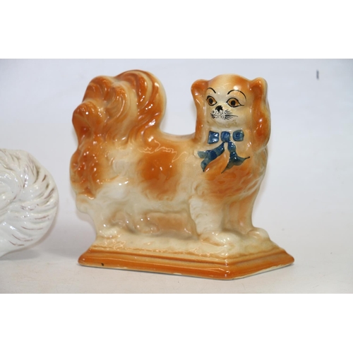 76 - Pair of Staffordshire style fire dogs and a wally dog, 30cm high.