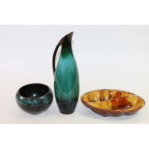 77 - Blue Mountain, Poole Pottery, and similar style jug, bowls and animal models.