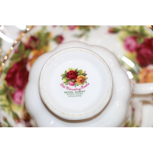 79 - Royal Albert Old Country Roses teaware to include a three-tier cake stand.