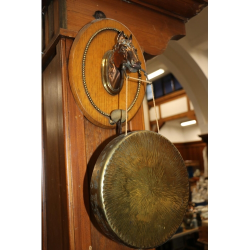 9 - Dinner gong mounted on an oak plaque held with horsehead.