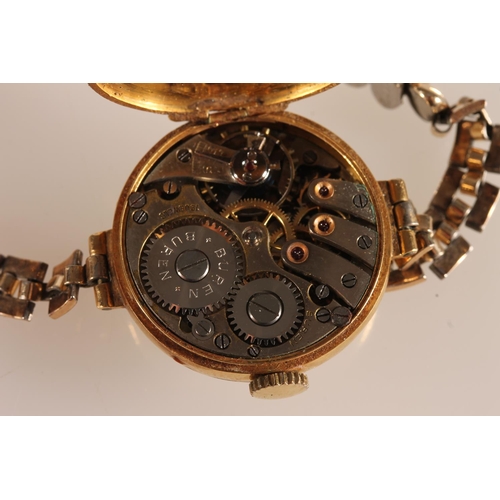 509 - Ladies 18ct gold cased wristwatch with Buren 15 jewel movement, on plated flex link bracelet, 22.4g ... 