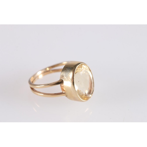 550 - Scottish 9ct gold dress ring set with oval citrine by Malcolm Gray of Ortak, 4.6g.