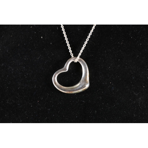 557 - Tiffany and Co Spain, a 925 silver heart shaped pendant on chain, designer Elsa Peretti, 10g gross, ... 