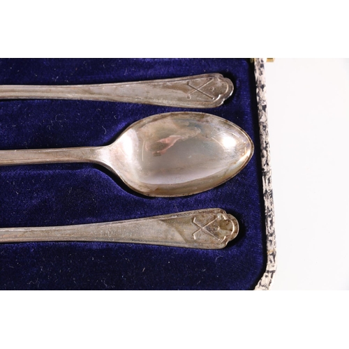 579 - Set of six silver golfing teaspoons by Walker and Hall, Sheffield 1933, 83g cased.