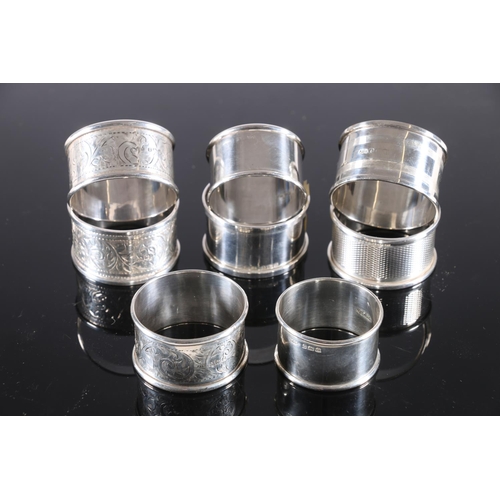 582 - Eight silver napkin rings, 107g.