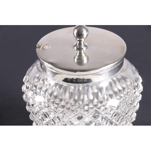 584 - Silver mounted preserve jar with hobnail cut glass reservoir with later stand.