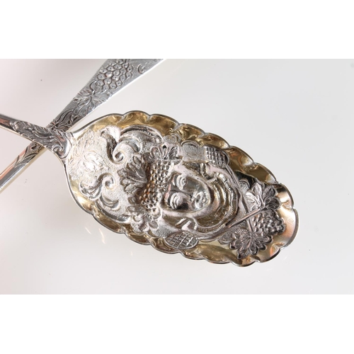 587 - Pair of Georgian silver berry serving spoons with mask and grape vine decoration, 94g.