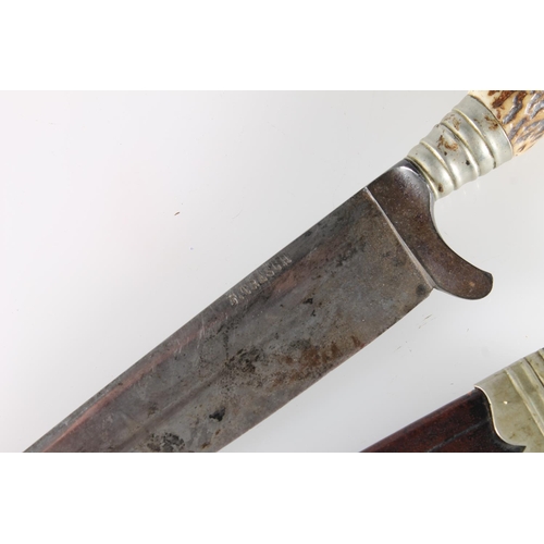 588 - Horn handled knife, the blade stamped 'F Tresch'.