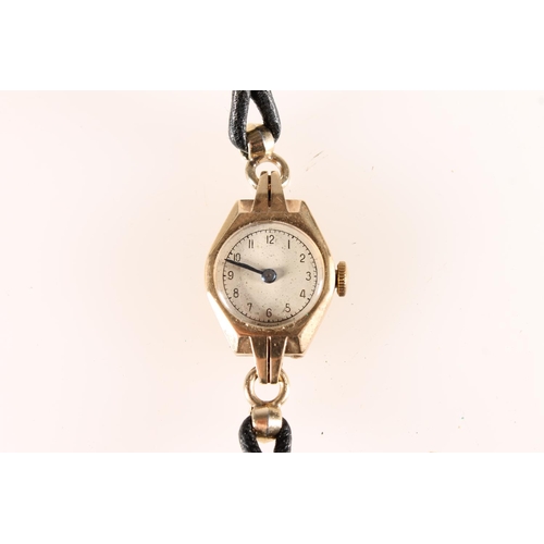 594 - Ladies 9ct gold cased wristwatch with Peertone works.