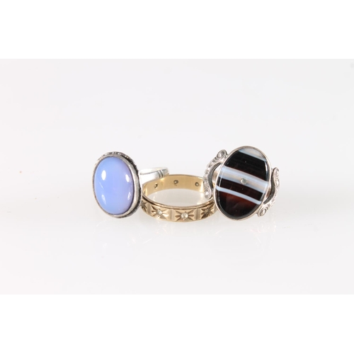 597 - 9ct gold eternity ring 2.3g, silver banded agate dress ring and another.