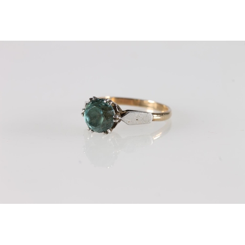 599 - 9ct gold solitaire ring with aquamarine light blue green coloured stone, 2.7g gross.