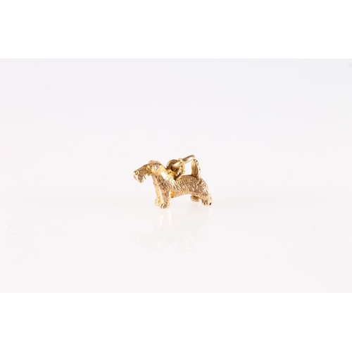 603 - 9ct gold bracelet charm in the form of a Scottie dog, 2.5g.