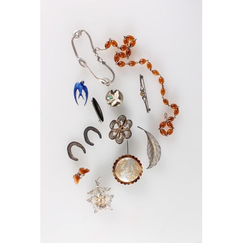 605 - Silver flex link bracelet, amber style bead necklace, two filigree brooches, two enamel brooches etc... 