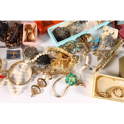 608 - Costume jewellery held in one shoe box to include necklaces, a pin cushion, etc.