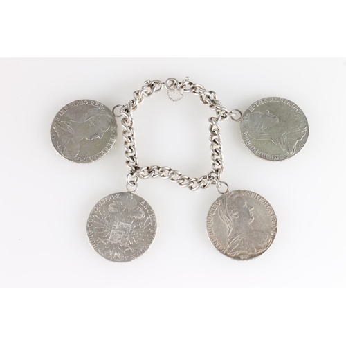 613 - Curb link bracelet set with four Austria Maria Theresa Thaler coins 1780 SFX, 144g gross.