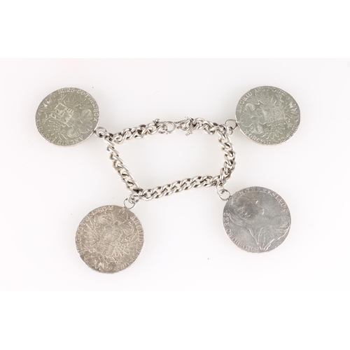 613 - Curb link bracelet set with four Austria Maria Theresa Thaler coins 1780 SFX, 144g gross.