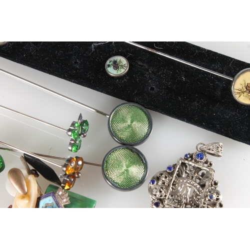 618 - Hat pins to include two guilloche enamel examples, two with gem set three leaf clover terminals, an ... 