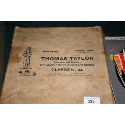 326 - Boxed set of Thomas Taylor lawn bowls.