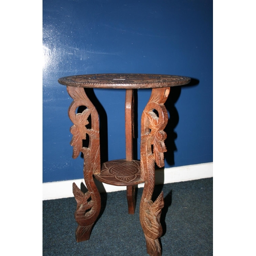 720 - Burmese/South East Asian hardwood occasional table, H64cm