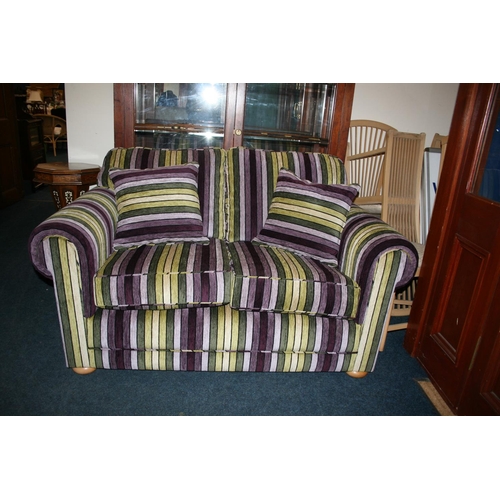 722 - Two seater sofa upholstered in polychrome stripe pattern, W160cm