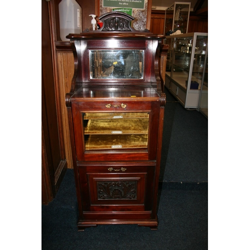 723 - Edwardian mahogany music cabinet with raised ledge and mirror back over integrated music shelves and... 