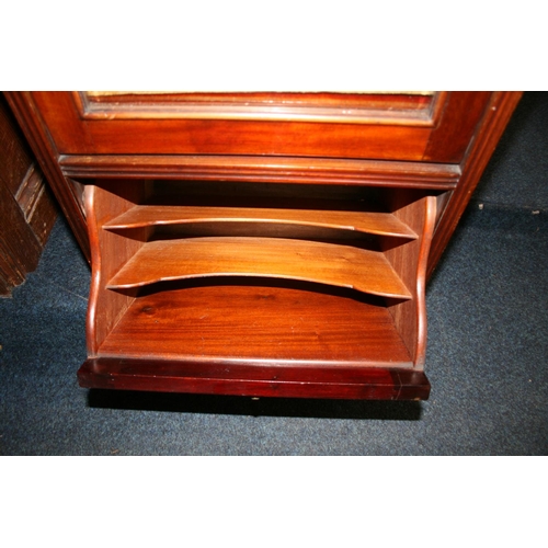 723 - Edwardian mahogany music cabinet with raised ledge and mirror back over integrated music shelves and... 