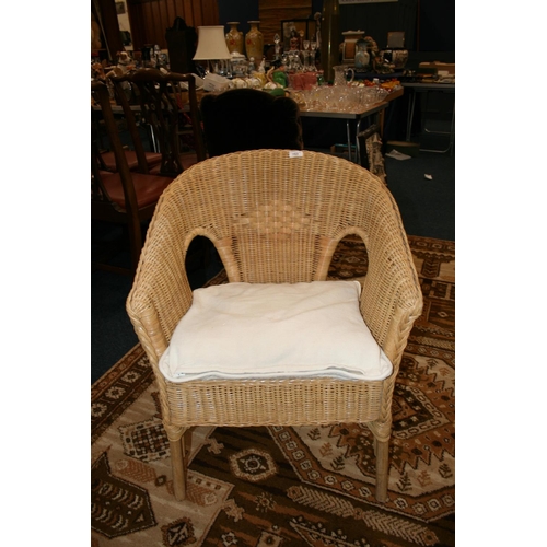 753 - Wicker conservatory armchair.