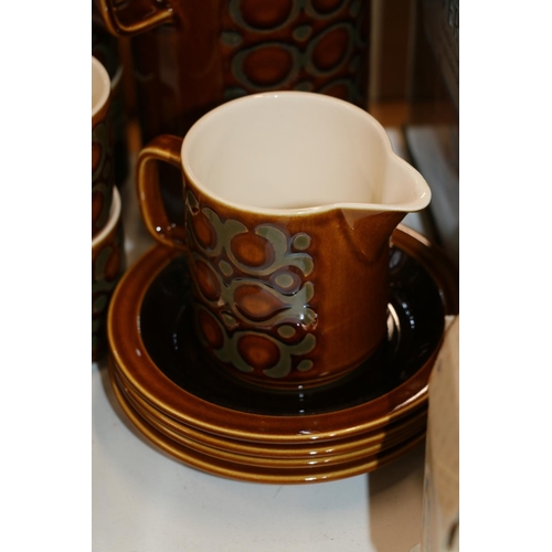 165 - Hornsea Bronte coffee set comprising a coffee pot, a sugar bowl, a milk jug and four cups and saucer... 