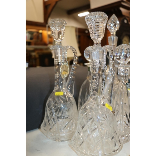 174 - Six cut glass decanters including a pair of Thomas Webb decanters, max H42cm