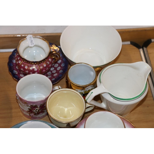 183 - Johnson Bros Art Deco shape teapot and a matching milk jug, and continental and other tourist cerami... 