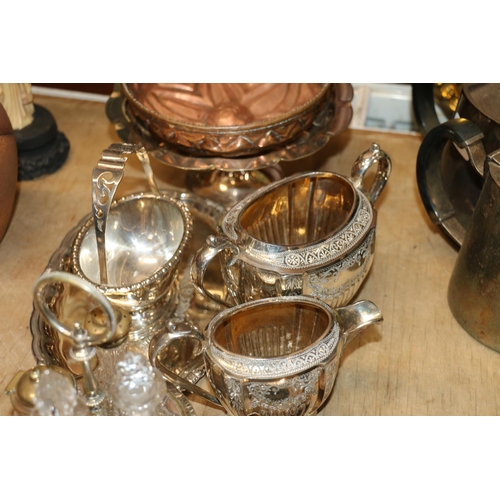 209 - Silver-plated wine coaster and comports, a copper jelly mould, and other metal ware.