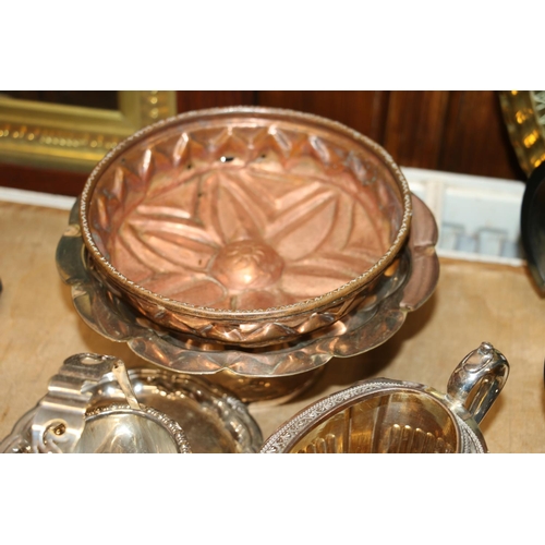 209 - Silver-plated wine coaster and comports, a copper jelly mould, and other metal ware.