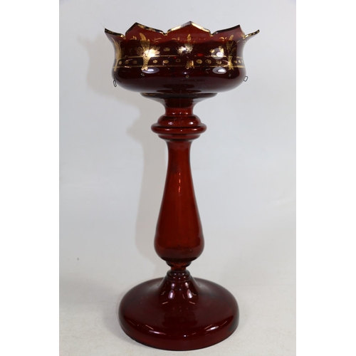 219 - Bohemian ruby glass table lustre with gilt decoration, 34cm.