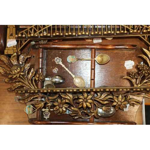 229 - Silver-plate and enamel souvenir spoons, and hanging rack.