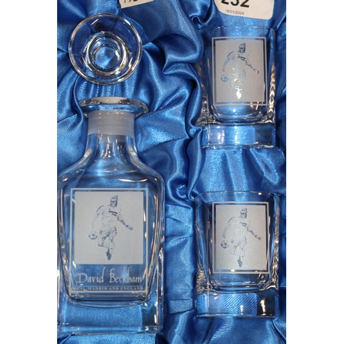 232 - Boxed David Beckham branded liqueur set to include a small bottle and two glasses, along with a Lled... 