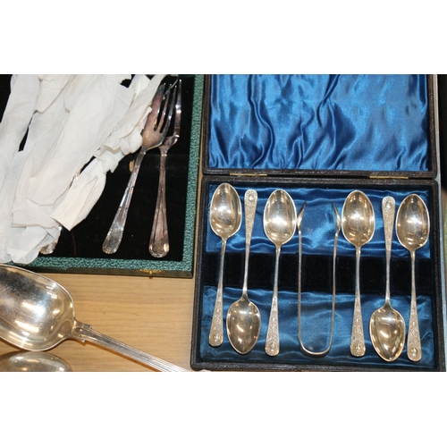 235 - Silver plate to include 19th century tablespoons, and other teaspoons, sugar tongs, cake forks (case... 