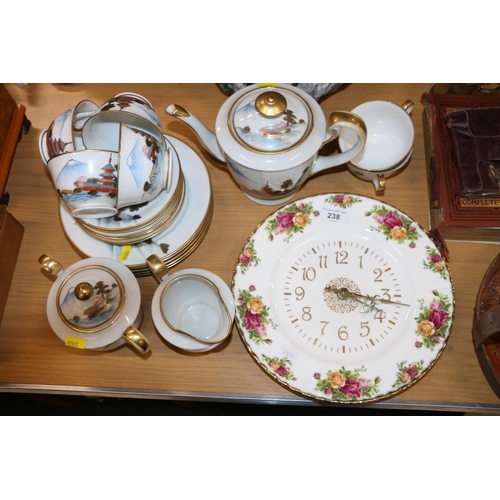 238 - Royal Albert Old Country Roses wall clock and a Japanese eggshell china part teaset.