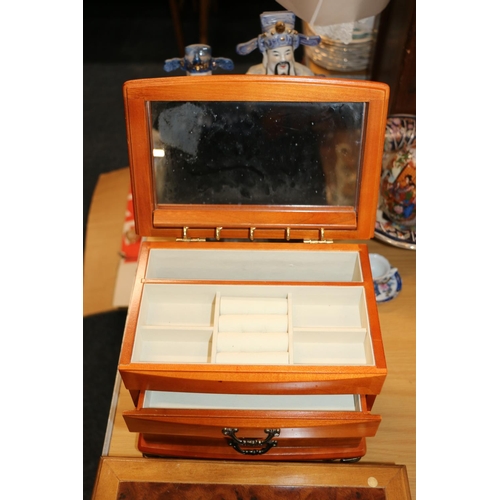 240 - Three wooden table jewellery boxes.