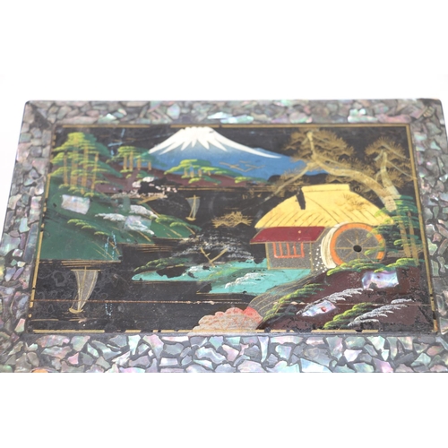 248 - Japanese black lacquer jewellery box with painted landscape decoration, 18cm wide.