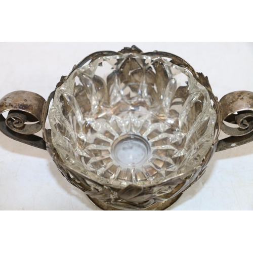 261 - Continental Art Nouveau silver-plated plate, and a similar two-handled vase with inset glass liner.