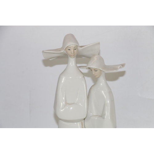 275 - Lladro figurine of two nuns.