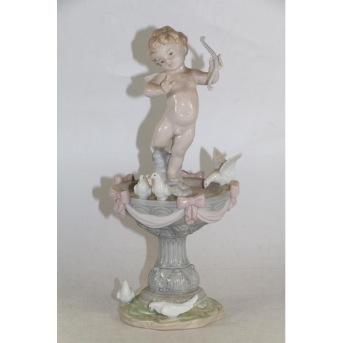 277 - Lladro model of a cherub on a fountain with doves.   (a/f)