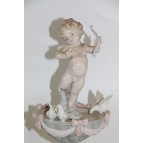 277 - Lladro model of a cherub on a fountain with doves.   (a/f)