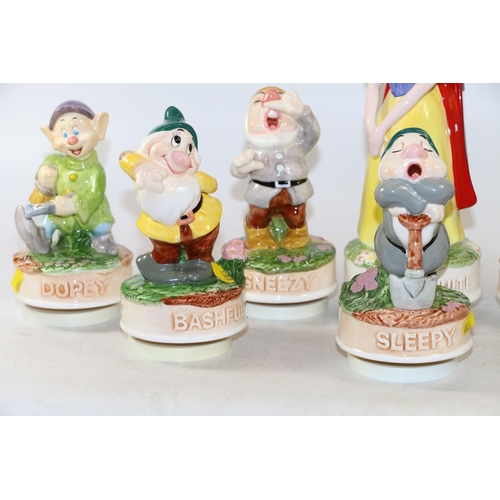 280 - Schmid Snow White and the Seven Dwarfs musical figures.  (8)